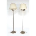 A pair of modern brass three branch standard lamps, with cream pleated shades, 28 by 170cm high. (2)