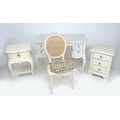 A group of modern cream painted furniture, comprising a French style dressing table, 110 by 54.5 by ... 