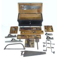 A vintage tool chest containing various woodworking and carpenters tools, including planes, chisels,... 