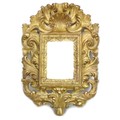 A 19th century Venetian style giltwood wall mirror, highly decorative with oversized foliate, shell ... 