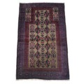 A Baluchi rug, 143 by 90cm.
