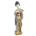 A good Japanese Satsuma porcelain figure by Kinkozan, Meiji period, modelled as a young Japanese wom... 