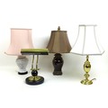 A group of four modern table lamps, comprising a brass desk lamp, a Chinese style white glazed and r... 