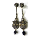 A pair of chandelier style drop earring set with diamonds, flower set to the top with peridot centre... 