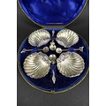 A set of four Victorian silver shell shaped salts, Mitchell Bosley and Co, Birmingham 1896, cased, 6... 