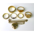 A group of 22ct and 9ct gold jewellery, comprising a 22ct gold band, size I, 2.4g,  five 9ct gold ge... 