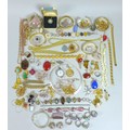 A collection of costume jewellery, including a Wedgwood pendant, a group of silver and semi precious... 