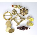 A group of 9ct gold jewellery, comprising brooches and cufflinks, including examples set with garnet... 