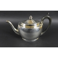 A George III silver teapot, with silver and ebony finial, ebony handle, possibly William Hall, Londo... 