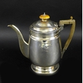 A George III silver coffee pot, of plain design with horn handle, armorial engraving on both sides, ... 
