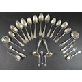 A group of Danish silver flatware, comprising two pieces of Sterling silver, a caddy spoon with loop... 
