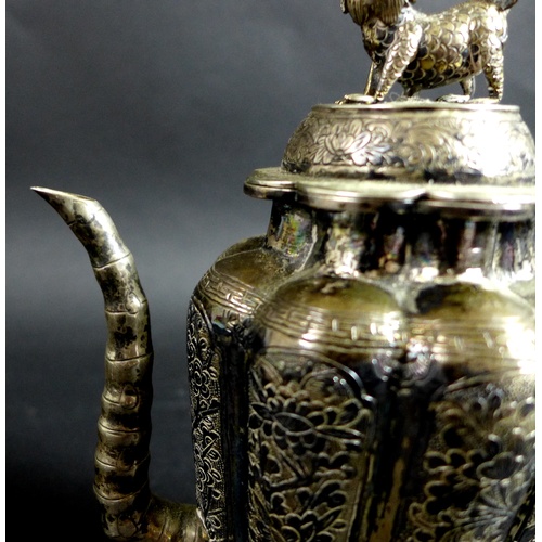 1 - A 19th century Chinese silver wine pot, of lobed tapering form, the cover with shi shi finial, faux ... 