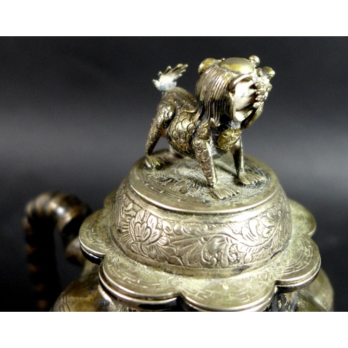 1 - A 19th century Chinese silver wine pot, of lobed tapering form, the cover with shi shi finial, faux ... 