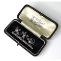 A silver bar brooch in the form of three birds with a sheaf of corn, stamped 925 verso, 4.6cm, boxed... 
