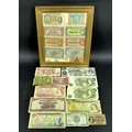 A collection of GB and World bank notes, including One Pound notes, United States Ten Cents Fraction... 