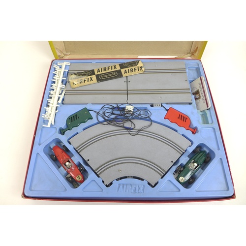 153 - A collection of Airfix and Scalextric toy model racing cars, including an Airfix Motor racing set wi... 