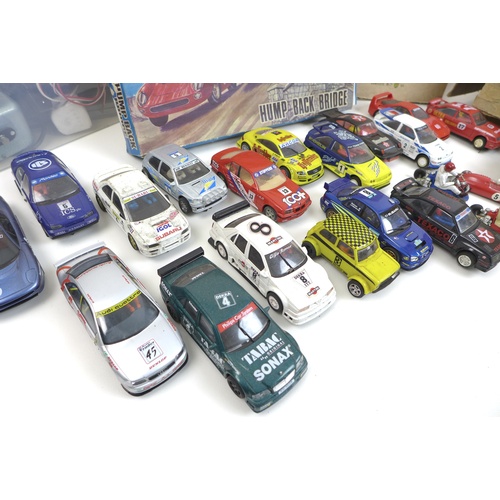 153 - A collection of Airfix and Scalextric toy model racing cars, including an Airfix Motor racing set wi... 