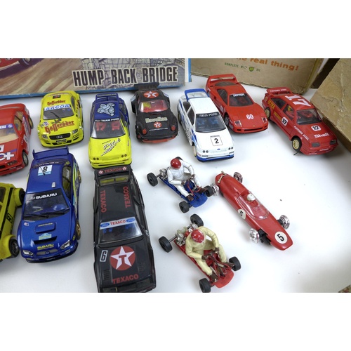 153 - A collection of Airfix and Scalextric toy model racing cars, including an Airfix Motor racing set wi... 