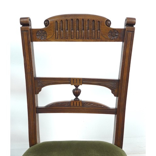 294 - A set of six late Victorian mahogany dining chairs, with carved decoration, the seats upholstered in... 