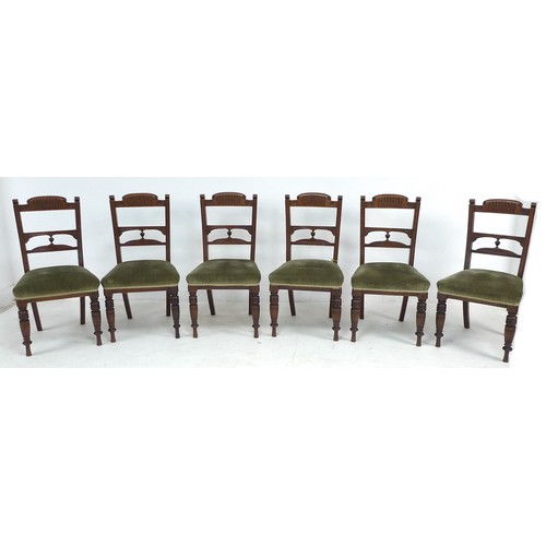 294 - A set of six late Victorian mahogany dining chairs, with carved decoration, the seats upholstered in... 