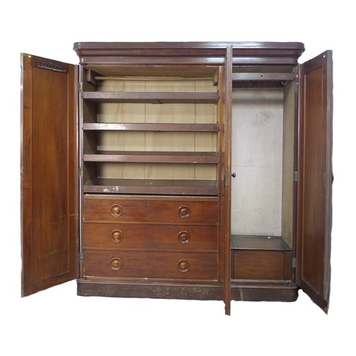 291 - A late Victorian mahogany wardrobe, of three sections, with central full length mirror door, fitted ... 