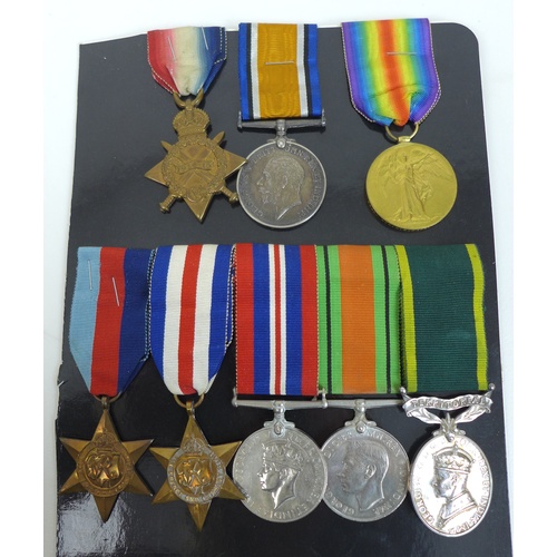 116 - A WWI trio and a WWII group of medals, comprising A 1914-15 star, a War medal and Defence medals, al... 