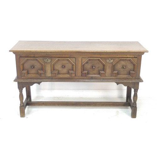 310 - An oak sideboard, two frieze drawers with Commonwealth style moulded geometric decoration, turned kn... 