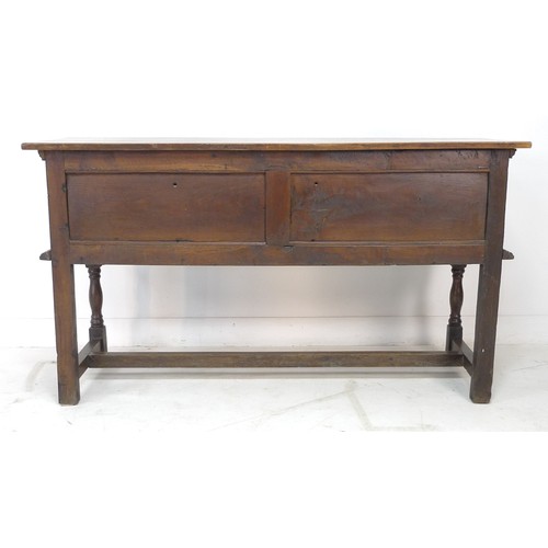 310 - An oak sideboard, two frieze drawers with Commonwealth style moulded geometric decoration, turned kn... 