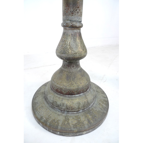 17 - A pair of fine 19th century Persian Islamic brass floor lamps, Mamluke revival, elaborately engraved... 