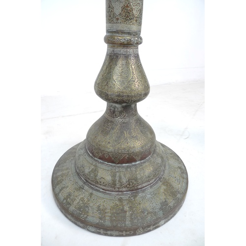 17 - A pair of fine 19th century Persian Islamic brass floor lamps, Mamluke revival, elaborately engraved... 