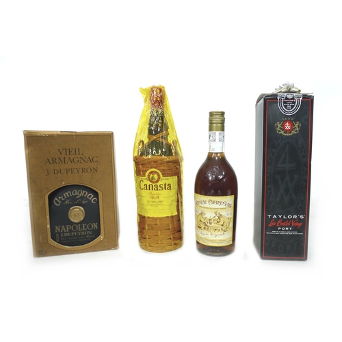 101 - A bottle of Armagnac, a bottle of Taylor's Port, boxed, a bottle of sherry, and a bottle of Pineau C... 