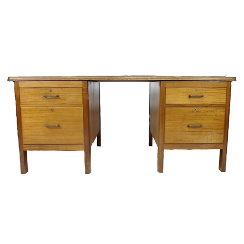 238 - A mid to late 20th century mahogany twin pedestal desk, with four drawers, 173 by 83.5 by 77cm high.