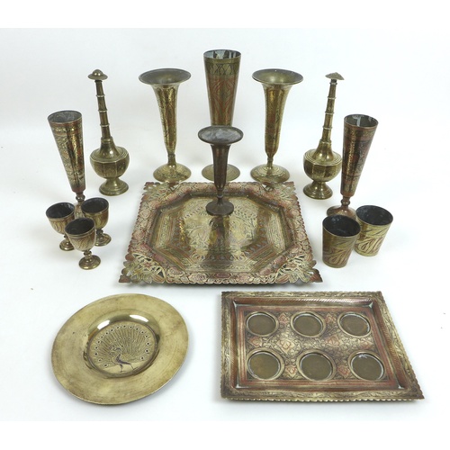 92 - A group of mid 20th century Indian metal wares, including candlesticks. (1 box)