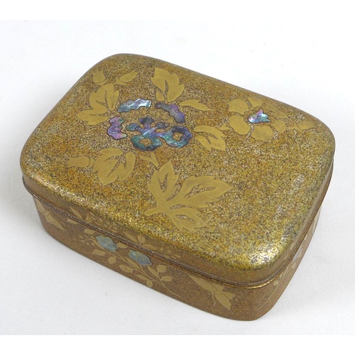 7 - A Japanese lacquer box of curved rectangular form, possibly a Kogo, early 20th century, with takamac... 