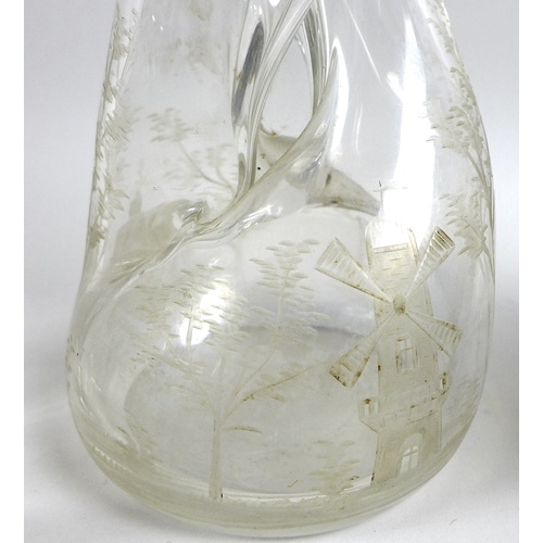 76 - A Dutch 830 silver collared twisted glass decanter etched with pastoral landscape, 21.5cm high, toge... 