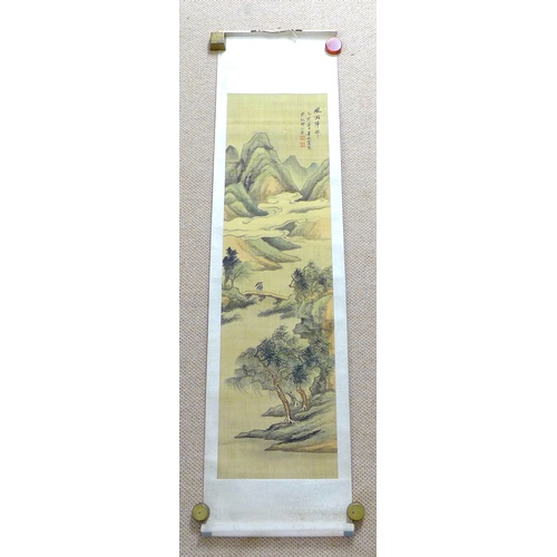 10 - A Japanese scroll painting or Kakemono, Meiji period depicting landscape with mountains, trees and w... 