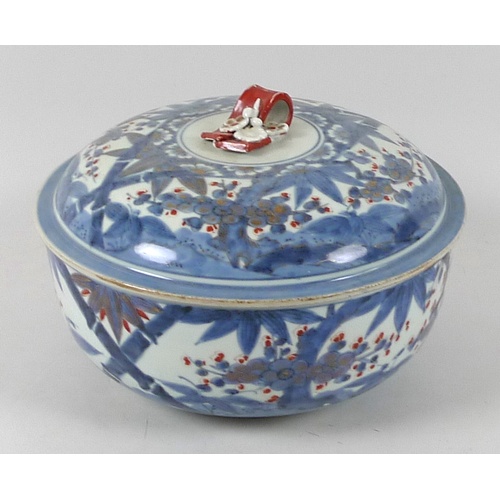 33 - A Chinese Qing Dynasty, 19th century, blue and white tureen and cover, decorated with bamboo and bra... 