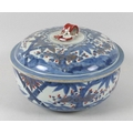 A Chinese Qing Dynasty, 19th century, blue and white tureen and cover, decorated with bamboo and bra... 