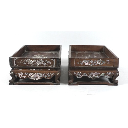 20 - A near pair of Chinese hardwood inlaid trays on stands, early 20th century, of rectangular form with... 