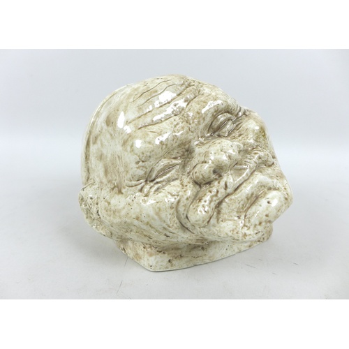 80 - A group of modern decorative sculptures, comprising a bust of the head of an old man, cream glaze, b... 