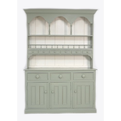 239 - A modern painted pine dresser, sage green and white, the plate rack fitted with six spice drawers an... 