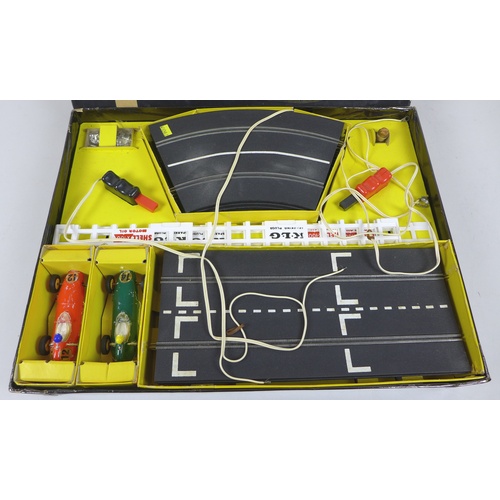 154 - A vintage Scalextric racing set GP1 and accessories, Grand Prix Series, circa 1963, in original box ... 