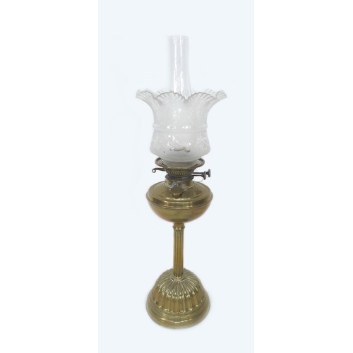 86 - A Victorian Duplex oil lamp, with brass well, etched glass shade and plain glass chimney, overall he... 