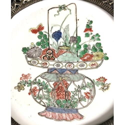 41 - A Chinese, Kangxi period, early 18th century, famille vert porcelain circular saucer dish, decorated... 