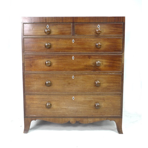 287 - A Regency mahogany chest of two over four graduating drawers, in two halves for transport, with turn... 