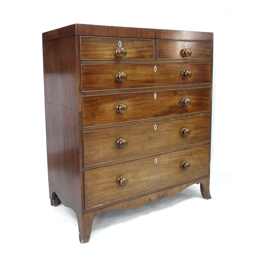 287 - A Regency mahogany chest of two over four graduating drawers, in two halves for transport, with turn... 