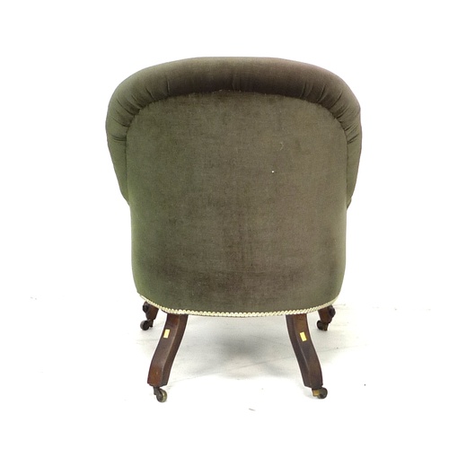 285 - A Victorian spoon back armchair, with green button back upholstery, raised upon mahogany cabriole sc... 