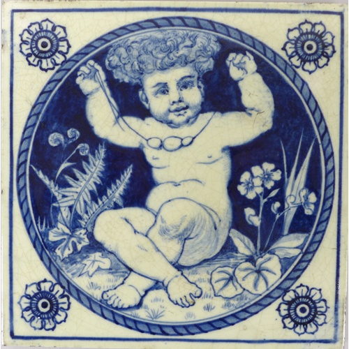 63 - A 19th century Mintons blue and white tile, featuring a cherub holding up a necklace, bearing marks ... 