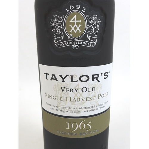 100 - A limited edition bottle of Taylor's 'Very Old Single Harvest 1965' port, with wooden presentation c... 