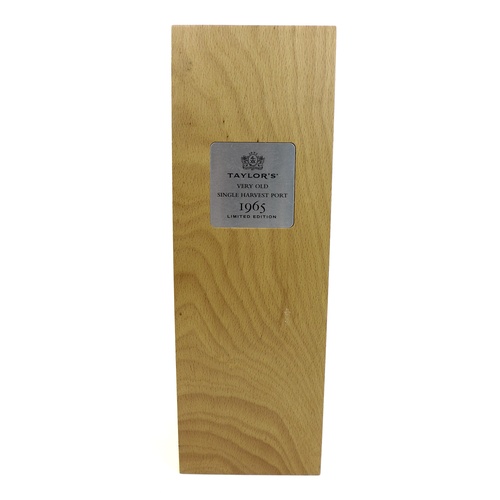 100 - A limited edition bottle of Taylor's 'Very Old Single Harvest 1965' port, with wooden presentation c... 